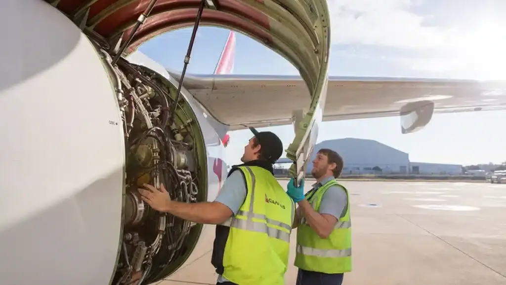 Qantas aircraft undergoing maintenance in engineering hangar