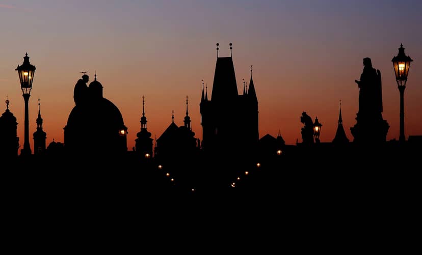 Prague skyline at dawn. View from Charles bridge to the East.