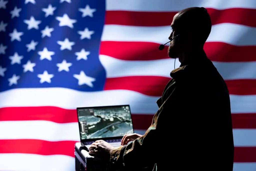 USA army patriot analyzes aerial reconnaissance data to come up with tactics gaining battlefield advantage. United States mil