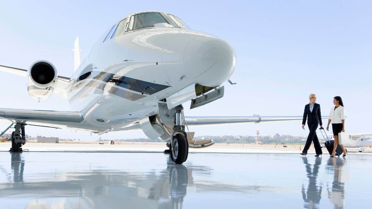 Luxury private jet parked at FBO terminal for first-time passengers"