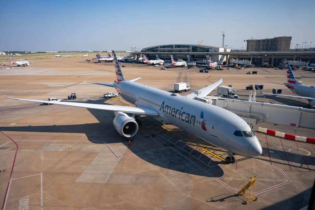 American Airlines plane at airport terminal gate