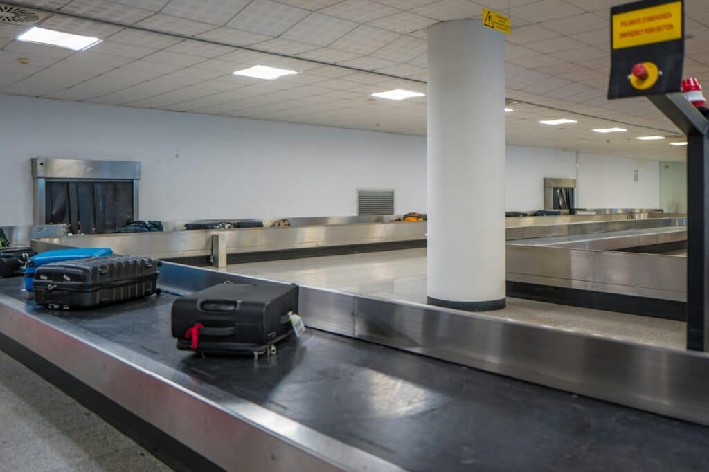 Airport baggage claim carousel with luggage