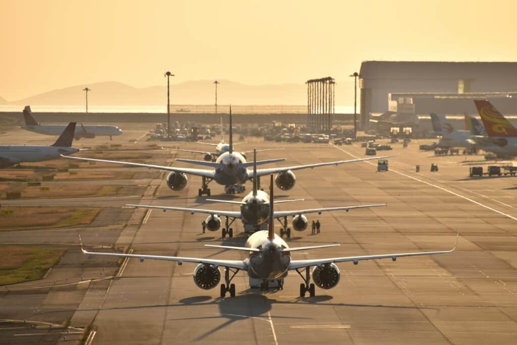 Commercial aircraft lineup at major international airport