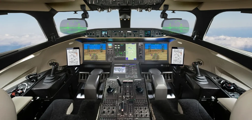 Falcon 10X vs Gulfstream G700: Which Ultra-Luxury Jet Is Better? 4 modern business jet flight deck with digital controls